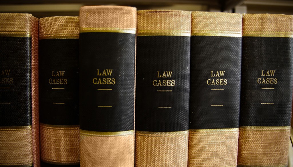 Closeup of law books in a row on a shelf
